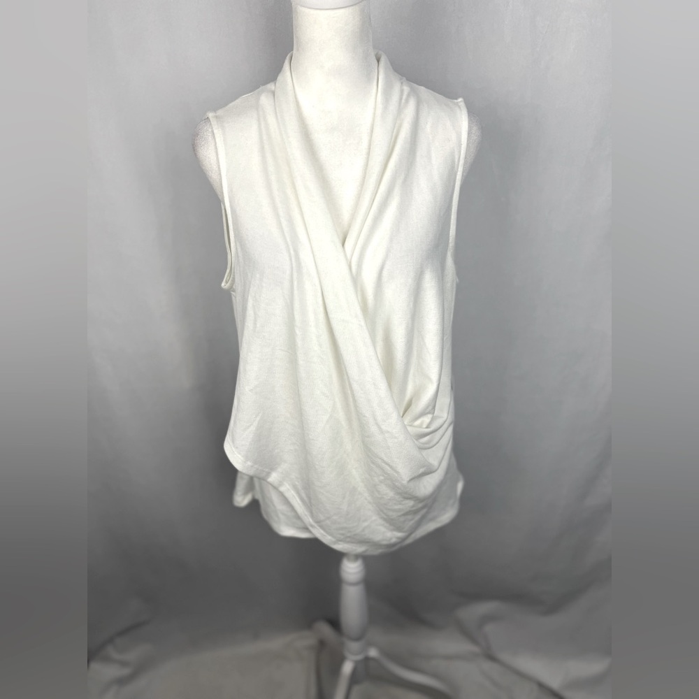 Sleeveless white blouse